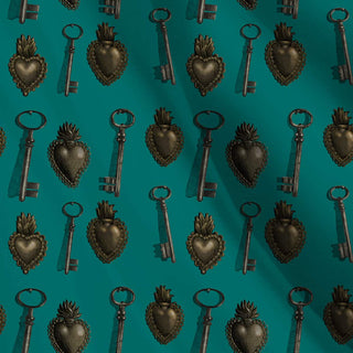 pattern of metal hearts and old keys on a jade background shown as fabric